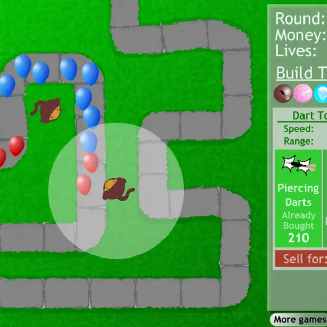 Bloons Tower Defense round 4 with red and blue balloons on a grey path past two dart monkeys